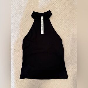 Lululemon black halter top, size 6. with built-in bra